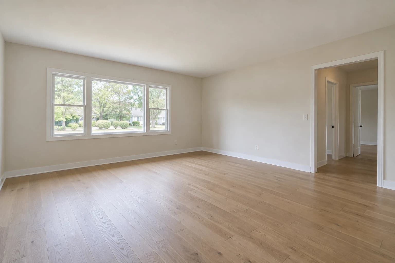 Fictional AI-generated empty living room used as the input to a recorded StagingGPT demonstration